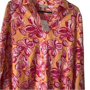 Woman’s floral spring button down blouse